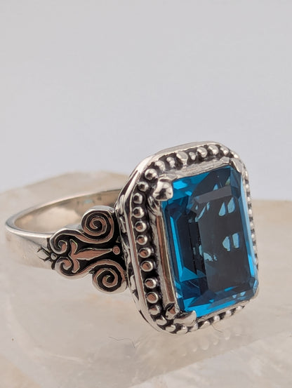 Emerald Cut Blue Topaz Ring