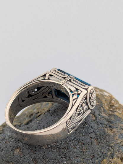 London Blue Topaz Elongated Emerald Cut Ring